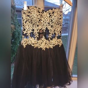 Back and gold homecoming dress